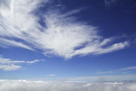 Sky above clouds Stock Photos