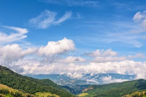 Sky above the high mountain range Stock Photos