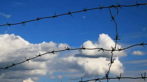 Sky and Barbed Wire Stock Footage 62556046
