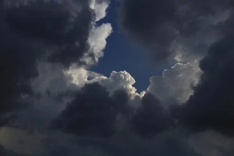 Sky and cloud background. silver lining concept. storm cloud surrounded a lig Stock Photos
