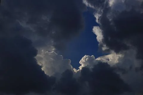 Sky and cloud background. silver lining concept. storm cloud surrounded a lig Stock Photos