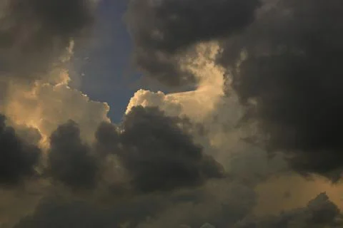 Sky and cloud background. silver lining concept. storm cloud surrounded a lig Stock Photos