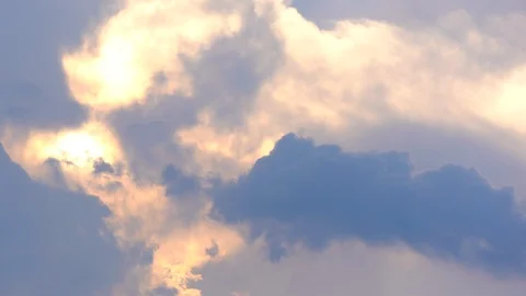 Sky and cloud motion on sunshine and rays of sunset backgroun, golden light sky Stock Footage 129918668