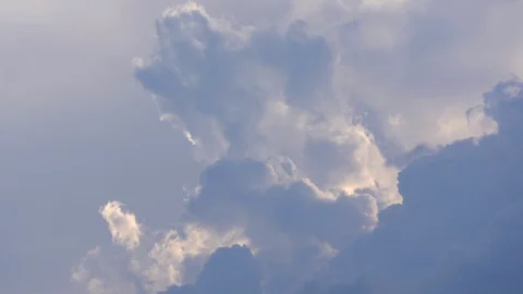 Sky and cloud motion on sunshine and rays of sunset backgroun, golden light sky 動画素材 129918813