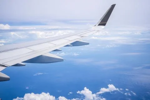 Sky and cloud as seen through window of an aircraft Stock Photos
