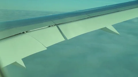 Sky and Clouds ander airplane wing. Video stock 125281477