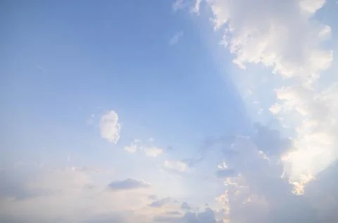 The sky and clouds in the daytime are beautiful. Stock Photos