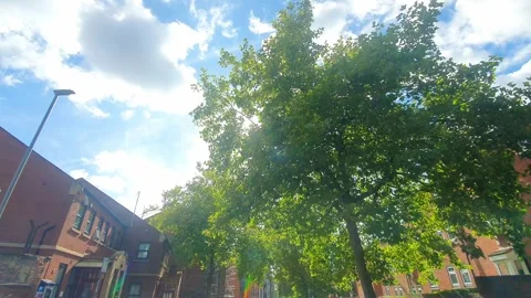 Sky and Clouds over British Cities of England During Car Drive Stock Footage 319576188