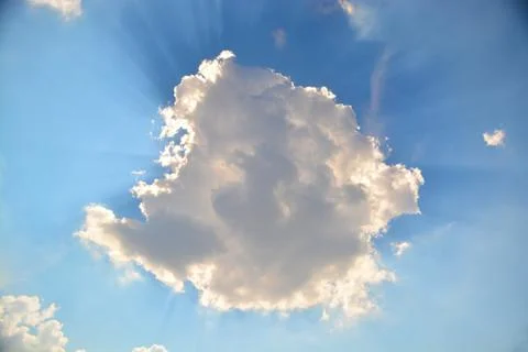 Sky and clouds. Sunlight passes through the clouds. Stock Photos