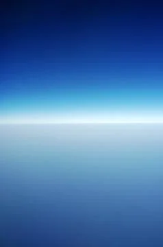 Sky and clouds Through Flight Window Stock Photos