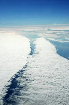 Sky and clouds Through Flight Window Stock Photos