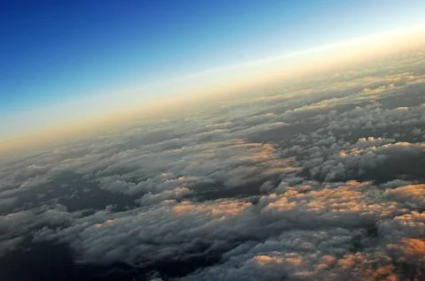 Sky and clouds Through Flight Window Stock Photos