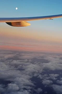 Sky and clouds Through Flight Window Stock Photos