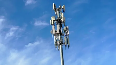 Sky and cloudscape behind a microwave relay cellular tower - timelapse Stock Footage 306295412