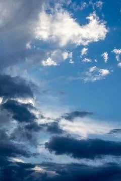 Sky and embossed clouds Stock Photos
