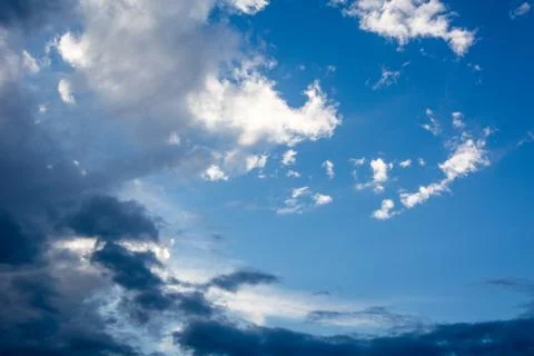 Sky and embossed clouds Stock Photos