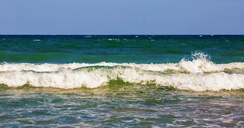 Sky and waves Stock Photos