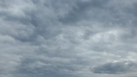 The sky appears overcast with dynamic cloud patterns creating an intriguing atmo Stock Photos