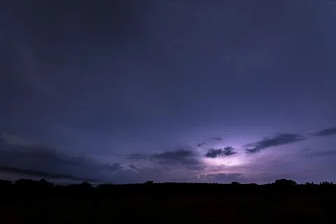 Sky background and lightning bolt at night Stock Photos