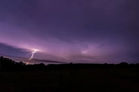Sky background and lightning bolt at night Stock Photos