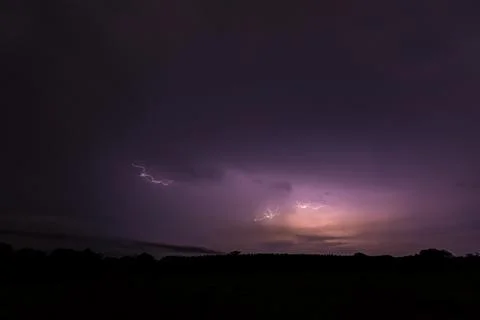 Sky background and lightning bolt at night Stock Photos