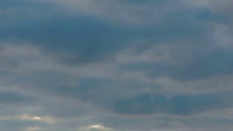 Sky background with clouds and sun rays in slow motion Stock-Footage 78209752