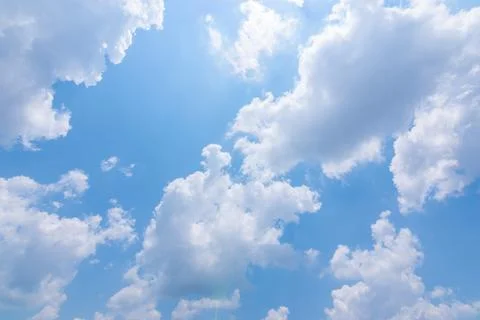Sky background, clouds and sun light Stock Photos