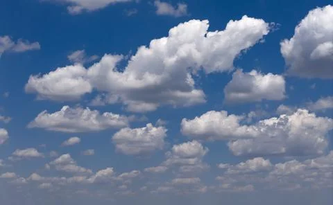 Sky background with copy clouds. Blue sky carries cumulus clouds. Bright sk.. Stock Photos