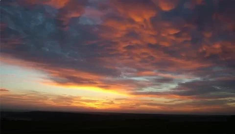 Sky background with fluffy clouds. Realistic dawn. Beautiful purple sky with Stock Illustration