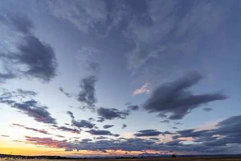 Sky background at sunset with blue clouds Foto stock