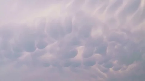 Sky background with unusual configuration of clouds. Video stock 77723765