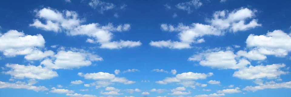 Sky background. White clouds on blue sky panoramic texture. Stock Photos