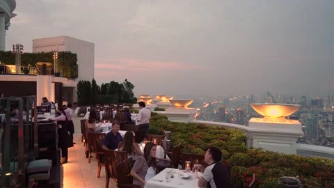 Sky Bar Restaurant At The Rooftop Of Lebua Hotel with People Dining, Video stock 170683587
