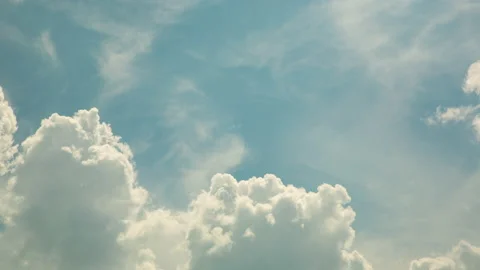 The sky, beautiful clouds move appear and disappear on a warm summer day. Stock Footage 203871782