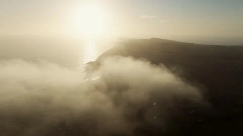 The sky is a beautiful shade of blue with a sun shining brightly Stock Footage 303710148