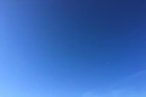 Sky blue background. clouds blue sky and sun. Stock Photos
