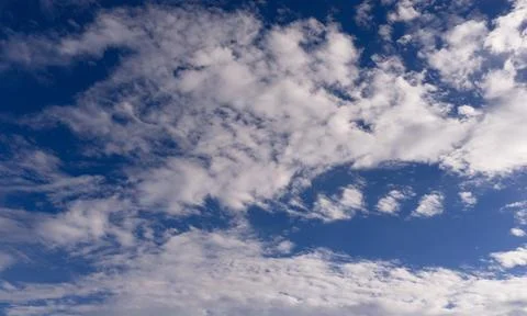 Sky blue cloudscape texture. Soft sky white pattern. Bright sky wallpaper b.. Stock Photos