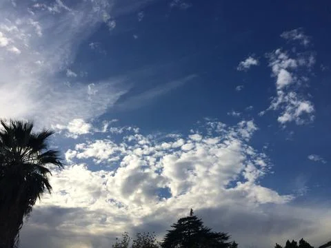 The sky is blue with a few clouds Stock Photos