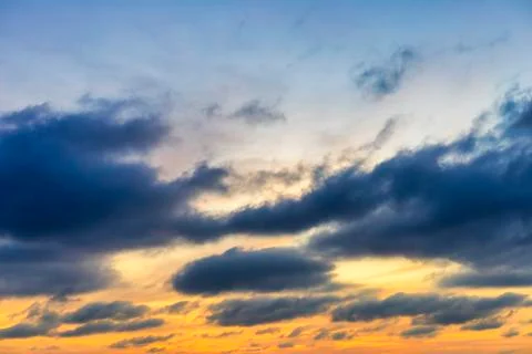 Sky with cloud and sun ray yellow and blue color background. With copy space  Stock Photos