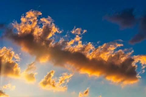 Sky with cloud and sun ray yellow and blue color background. With copy space  Stock Photos