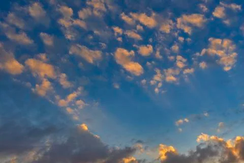 Sky with cloud and sun ray yellow and blue color background. With copy space  Stock Photos