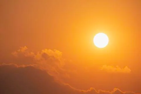 The sky with cloud and sunset for clean energy power, clear weather concept. Stock Photos