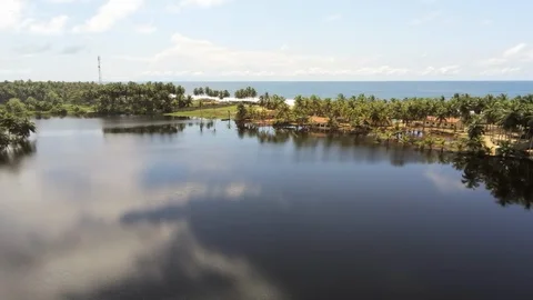Sky cloud reflections on laguna Bassam Stock Footage 97980045