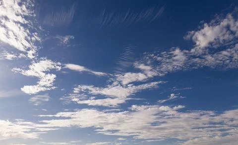 Sky cloud texture on background blue. Bright sky soft white in pattern. Day.. Stock Photos