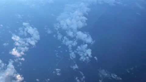 Sky Cloud through aircraft window  Stock Footage 132342199