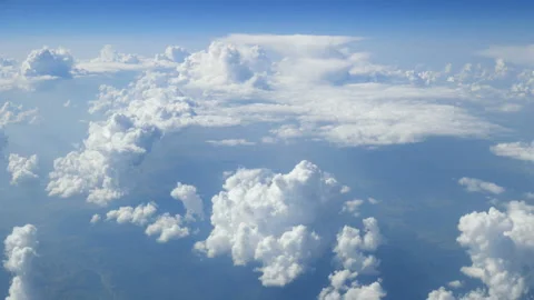 Sky with clouds from airplane window, View on the blue sky with clouds, trave Stock Footage 132782592