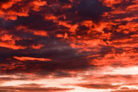 Sky, clouds and afterglow Stock Photos