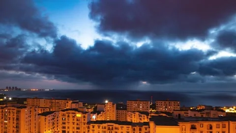 SKY, CLOUDS AND BUILDING TIME LAPSE IN ALGIERS Stock Footage 131338109