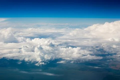 Sky clouds and land background Stock Photos