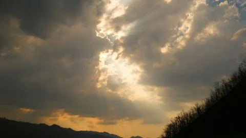 Sky Clouds and Light rays Stock Photos